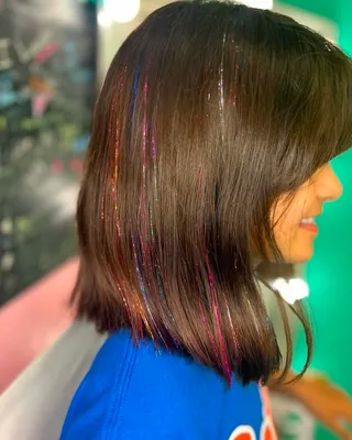 Shimmering clip-in hair tinsel strands